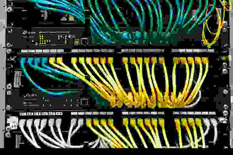 Cat5e and Cat6 structured cabling neatly patched into a network rack